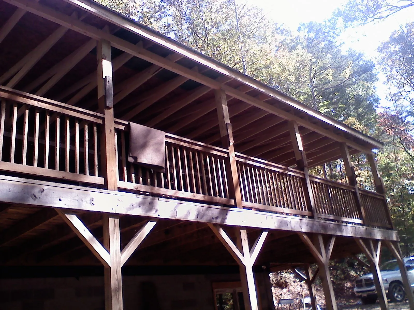 Timber framing under a new elevated porch and deck — Roof Leak Repair in Mayesville by Roofing Brothers